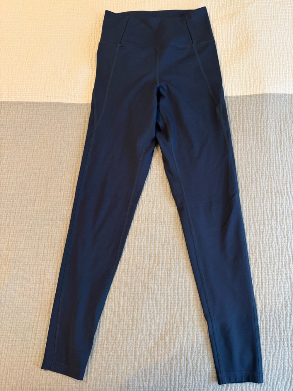 girlfriend collective dark navy leggings with interior logo
